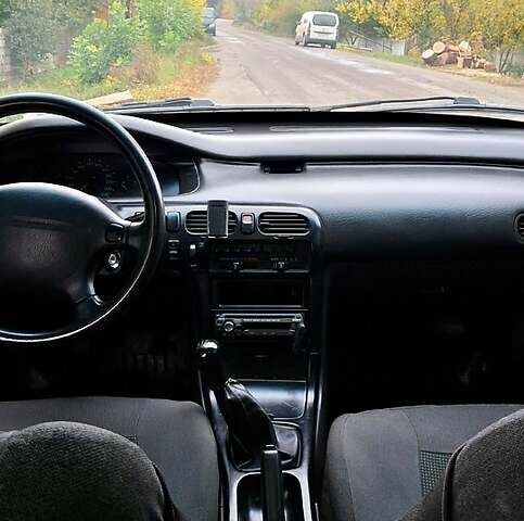 Синий Мазда 626, объемом двигателя 1.8 л и пробегом 461 тыс. км за 1700 $, фото 2 на Automoto.ua