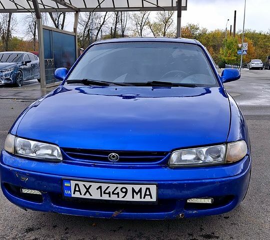 Синий Мазда 626, объемом двигателя 1.8 л и пробегом 461 тыс. км за 1700 $, фото 2 на Automoto.ua