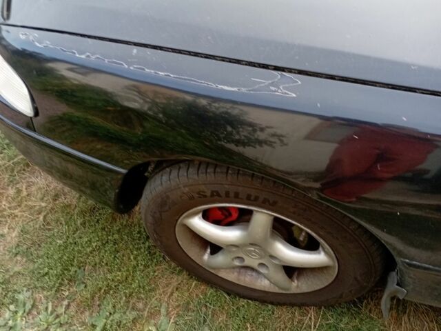 Синий Мазда 626, объемом двигателя 2 л и пробегом 450 тыс. км за 2500 $, фото 4 на Automoto.ua