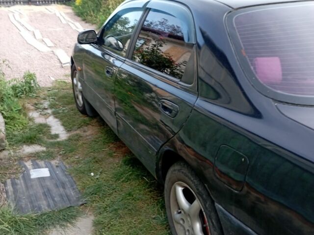 Синий Мазда 626, объемом двигателя 2 л и пробегом 450 тыс. км за 2500 $, фото 3 на Automoto.ua