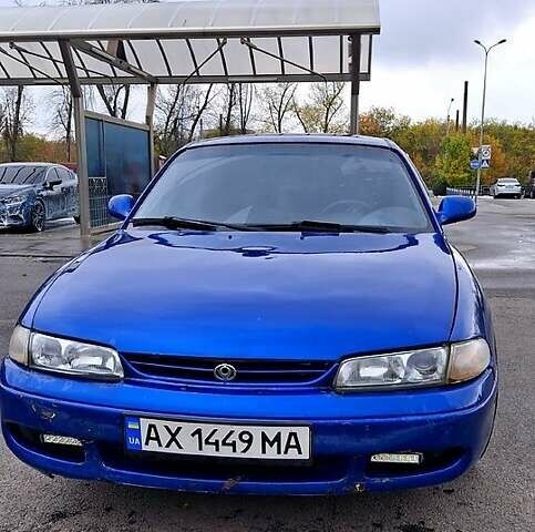 Синий Мазда 626, объемом двигателя 1.8 л и пробегом 461 тыс. км за 1700 $, фото 1 на Automoto.ua