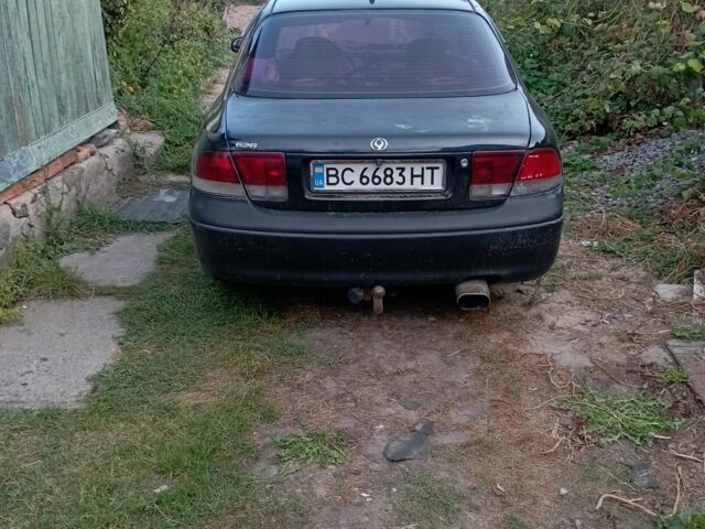 Синий Мазда 626, объемом двигателя 2 л и пробегом 450 тыс. км за 2500 $, фото 1 на Automoto.ua