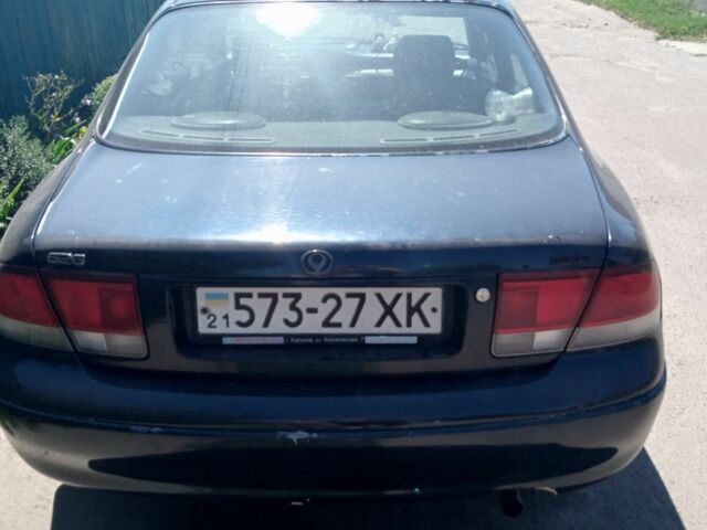 Синій Мазда 626, об'ємом двигуна 2 л та пробігом 300 тис. км за 1600 $, фото 3 на Automoto.ua