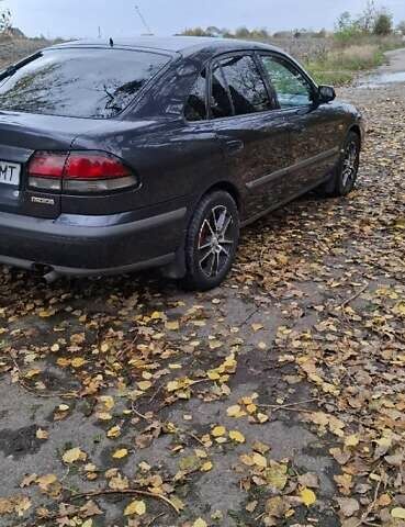 Синий Мазда 626, объемом двигателя 1.84 л и пробегом 300 тыс. км за 2700 $, фото 3 на Automoto.ua