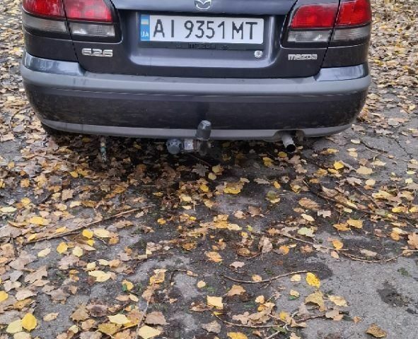 Синий Мазда 626, объемом двигателя 1.8 л и пробегом 1000 тыс. км за 2800 $, фото 5 на Automoto.ua