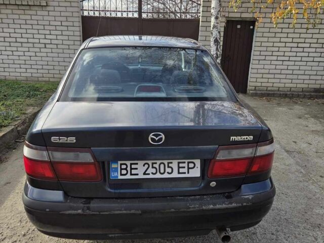 Синий Мазда 626, объемом двигателя 2 л и пробегом 300 тыс. км за 2300 $, фото 3 на Automoto.ua