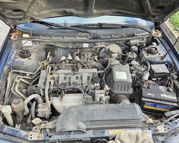 Синий Мазда 626, объемом двигателя 2 л и пробегом 305 тыс. км за 2300 $, фото 6 на Automoto.ua