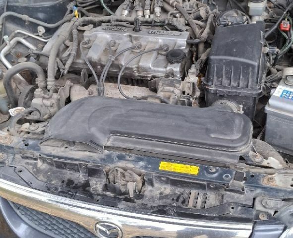 Синий Мазда 626, объемом двигателя 1.8 л и пробегом 1000 тыс. км за 2800 $, фото 7 на Automoto.ua