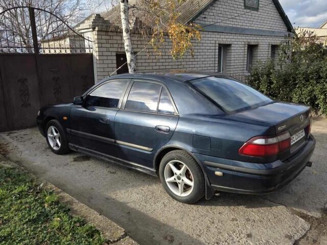 Синий Мазда 626, объемом двигателя 2 л и пробегом 300 тыс. км за 2300 $, фото 1 на Automoto.ua