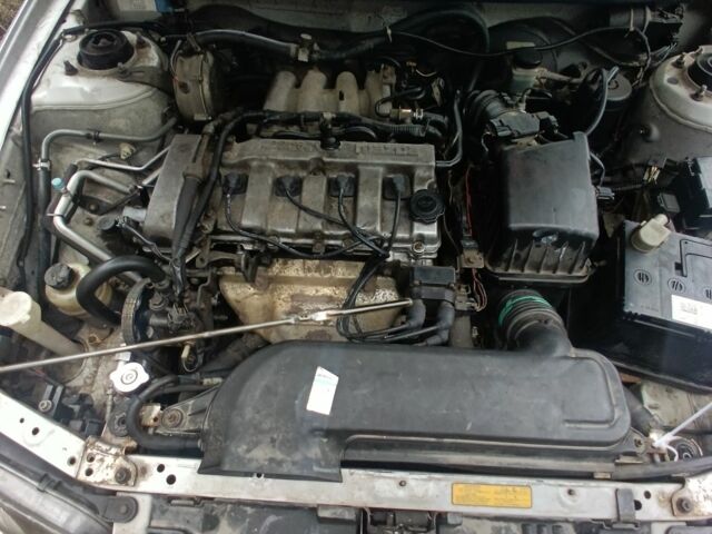 Синий Мазда 626, объемом двигателя 2 л и пробегом 300 тыс. км за 946 $, фото 4 на Automoto.ua