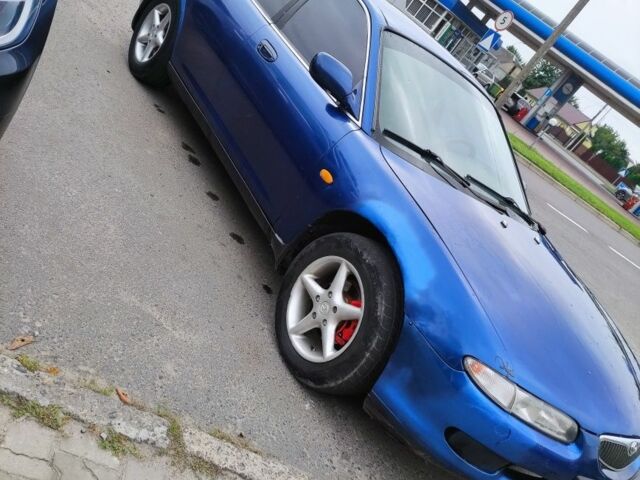 Синий Мазда 626, объемом двигателя 2 л и пробегом 100 тыс. км за 1500 $, фото 1 на Automoto.ua