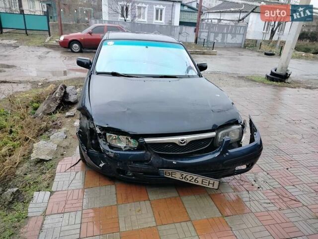 Синий Мазда 626, объемом двигателя 2 л и пробегом 320 тыс. км за 1500 $, фото 11 на Automoto.ua