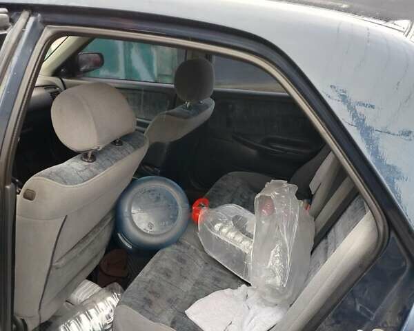 Синий Мазда 626, объемом двигателя 2 л и пробегом 320 тыс. км за 1500 $, фото 2 на Automoto.ua