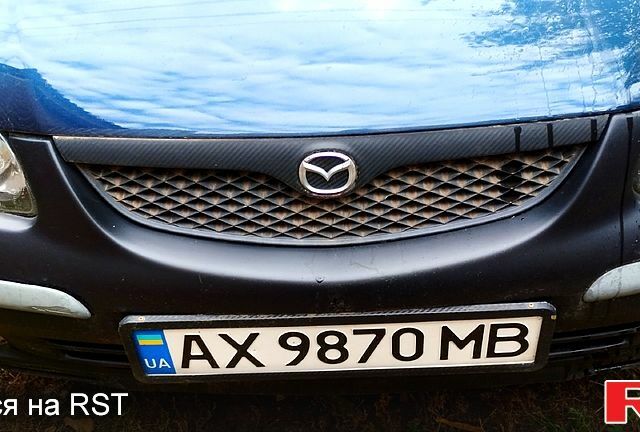 Синій Мазда 626, об'ємом двигуна 2 л та пробігом 382 тис. км за 3300 $, фото 8 на Automoto.ua