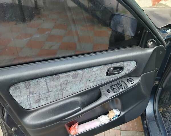 Синий Мазда 626, объемом двигателя 2 л и пробегом 320 тыс. км за 1500 $, фото 5 на Automoto.ua
