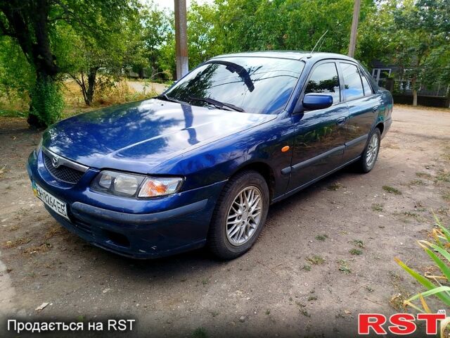 Синий Мазда 626, объемом двигателя 1.8 л и пробегом 88 тыс. км за 1750 $, фото 1 на Automoto.ua