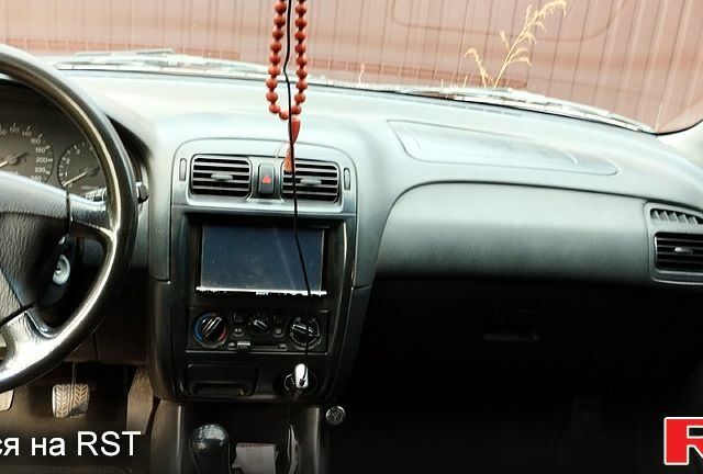 Синій Мазда 626, об'ємом двигуна 2 л та пробігом 382 тис. км за 3300 $, фото 5 на Automoto.ua