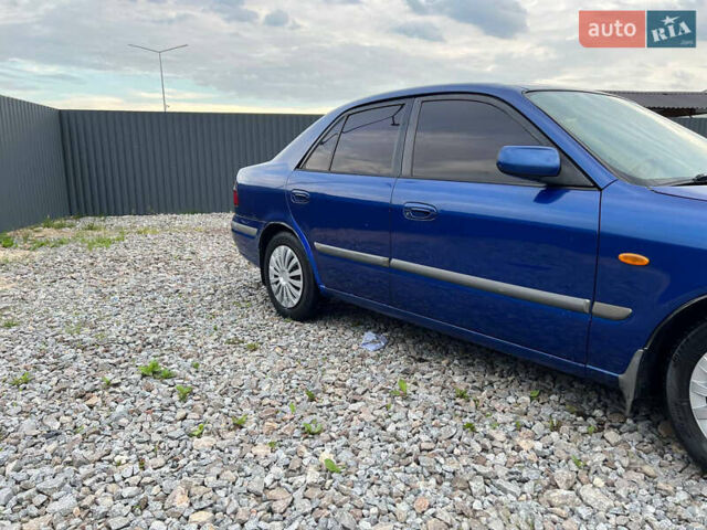 Синій Мазда 626, об'ємом двигуна 2 л та пробігом 298 тис. км за 1700 $, фото 2 на Automoto.ua