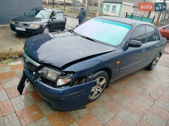 Синий Мазда 626, объемом двигателя 2 л и пробегом 320 тыс. км за 1500 $, фото 8 на Automoto.ua