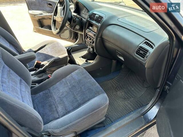 Синий Мазда 626, объемом двигателя 2 л и пробегом 260 тыс. км за 3000 $, фото 16 на Automoto.ua