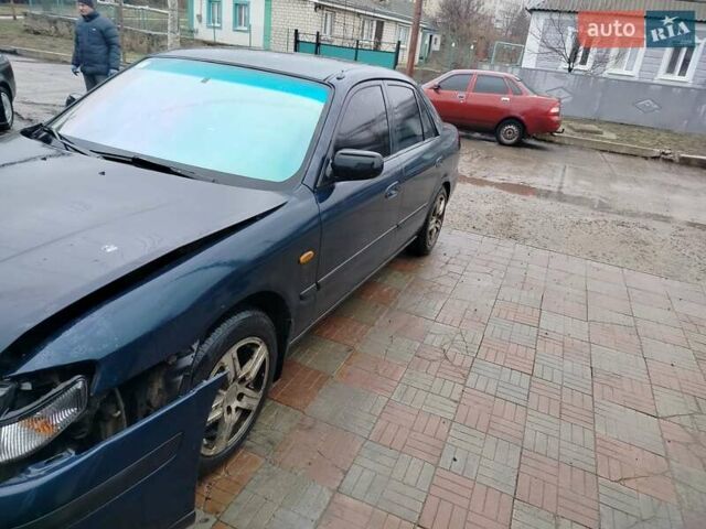 Синий Мазда 626, объемом двигателя 2 л и пробегом 320 тыс. км за 1500 $, фото 7 на Automoto.ua