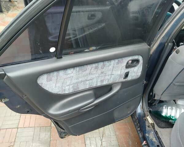 Синий Мазда 626, объемом двигателя 2 л и пробегом 320 тыс. км за 1500 $, фото 3 на Automoto.ua