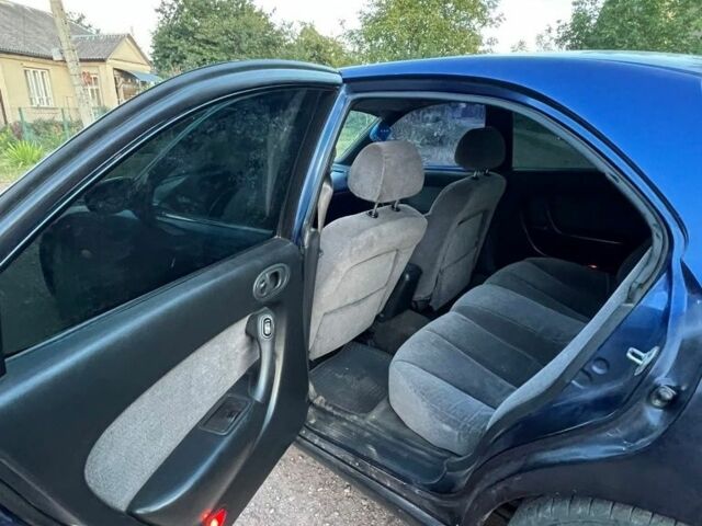 Синий Мазда 626, объемом двигателя 2 л и пробегом 100 тыс. км за 1500 $, фото 4 на Automoto.ua