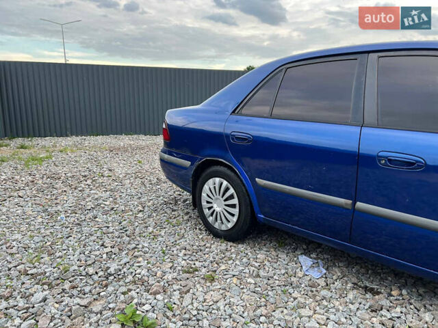 Синій Мазда 626, об'ємом двигуна 2 л та пробігом 298 тис. км за 1700 $, фото 6 на Automoto.ua