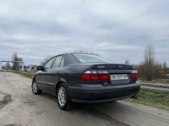 Синий Мазда 626, объемом двигателя 1.8 л и пробегом 247 тыс. км за 2000 $, фото 2 на Automoto.ua