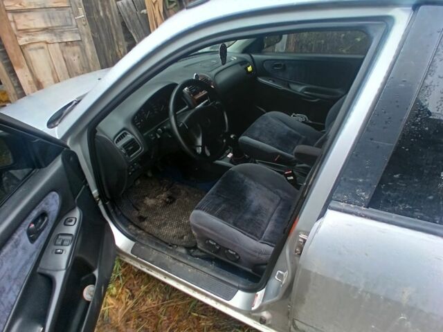 Синий Мазда 626, объемом двигателя 2 л и пробегом 300 тыс. км за 946 $, фото 3 на Automoto.ua