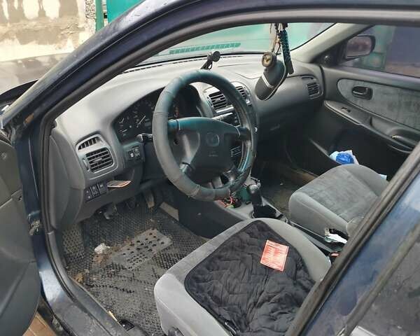 Синий Мазда 626, объемом двигателя 2 л и пробегом 320 тыс. км за 1500 $, фото 1 на Automoto.ua