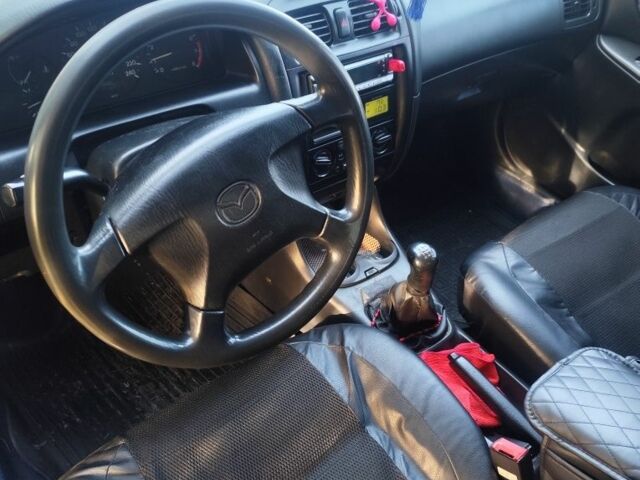 Синий Мазда 626, объемом двигателя 0 л и пробегом 333 тыс. км за 1650 $, фото 3 на Automoto.ua