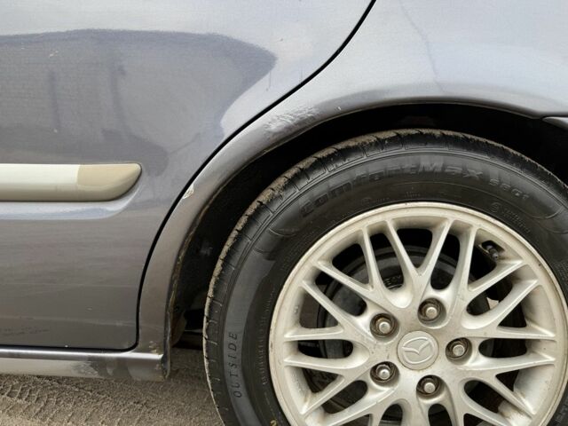 Синий Мазда 626, объемом двигателя 1.8 л и пробегом 247 тыс. км за 2000 $, фото 4 на Automoto.ua