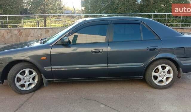 Синий Мазда 626, объемом двигателя 2 л и пробегом 260 тыс. км за 3000 $, фото 6 на Automoto.ua