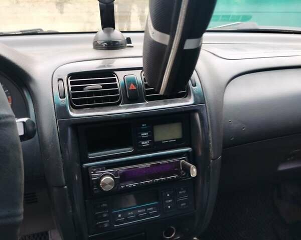 Синий Мазда 626, объемом двигателя 2 л и пробегом 320 тыс. км за 1500 $, фото 4 на Automoto.ua