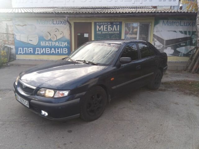 Синий Мазда 626, объемом двигателя 2 л и пробегом 480 тыс. км за 1650 $, фото 1 на Automoto.ua