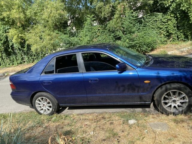 Синий Мазда 626, объемом двигателя 1.8 л и пробегом 330 тыс. км за 2500 $, фото 3 на Automoto.ua