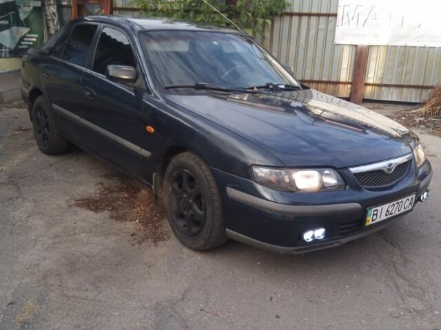 Синий Мазда 626, объемом двигателя 2 л и пробегом 480 тыс. км за 1650 $, фото 2 на Automoto.ua