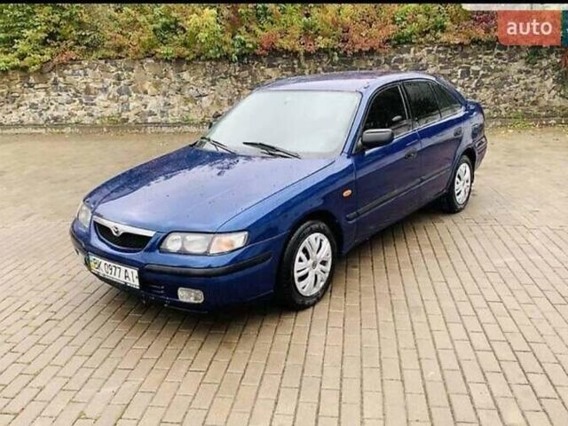 Синій Мазда 626, об'ємом двигуна 2 л та пробігом 320 тис. км за 3200 $, фото 3 на Automoto.ua