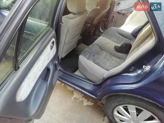 Синій Мазда 626, об'ємом двигуна 1.8 л та пробігом 389 тис. км за 2700 $, фото 11 на Automoto.ua