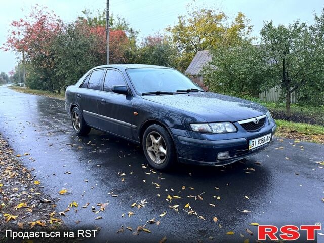 Синий Мазда 626, объемом двигателя 2 л и пробегом 200 тыс. км за 2750 $, фото 1 на Automoto.ua