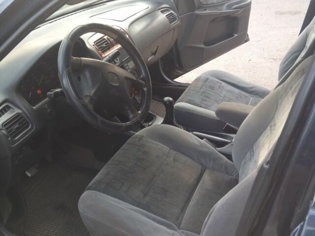 Синий Мазда 626, объемом двигателя 2 л и пробегом 480 тыс. км за 1650 $, фото 5 на Automoto.ua