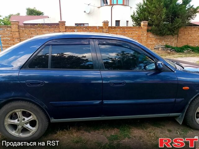 Синій Мазда 626, об'ємом двигуна 2 л та пробігом 0 тис. км за 2600 $, фото 13 на Automoto.ua