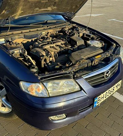 Синій Мазда 626, об'ємом двигуна 2 л та пробігом 230 тис. км за 2700 $, фото 4 на Automoto.ua