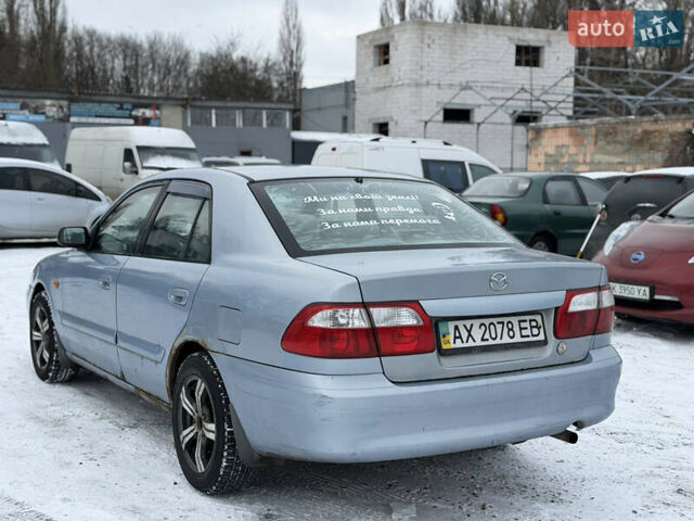 Синий Мазда 626, объемом двигателя 1.99 л и пробегом 360 тыс. км за 1500 $, фото 13 на Automoto.ua