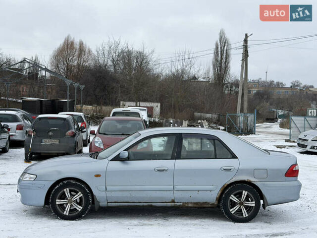 Синий Мазда 626, объемом двигателя 1.99 л и пробегом 360 тыс. км за 1500 $, фото 6 на Automoto.ua