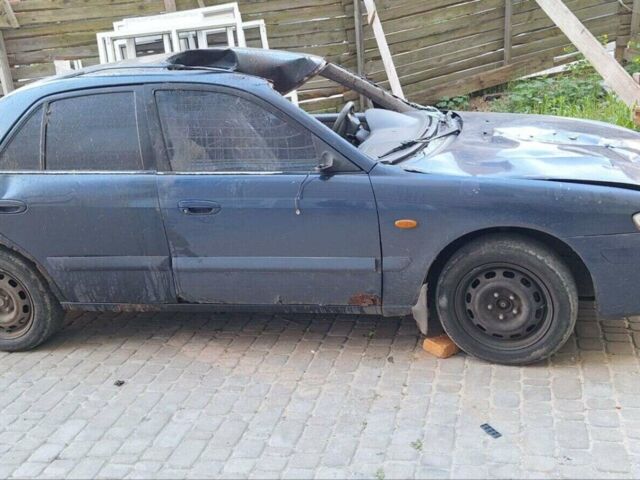 Синий Мазда 626, объемом двигателя 2 л и пробегом 420 тыс. км за 800 $, фото 1 на Automoto.ua