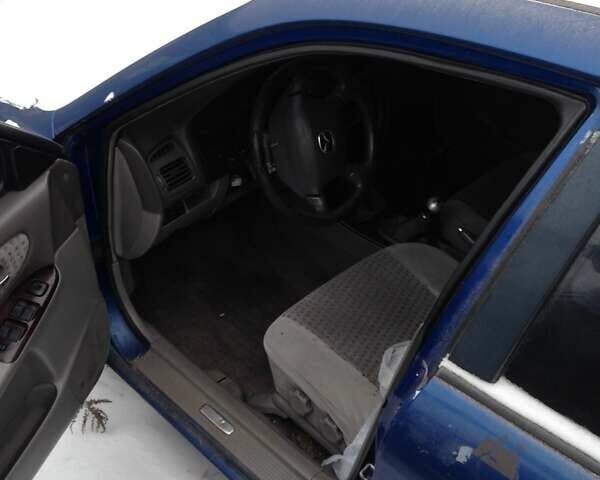 Синий Мазда 626, объемом двигателя 2 л и пробегом 725 тыс. км за 213 $, фото 6 на Automoto.ua