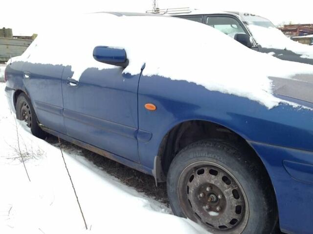 Синий Мазда 626, объемом двигателя 2 л и пробегом 725 тыс. км за 213 $, фото 3 на Automoto.ua