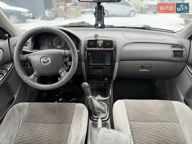 Синий Мазда 626, объемом двигателя 1.99 л и пробегом 360 тыс. км за 1500 $, фото 16 на Automoto.ua